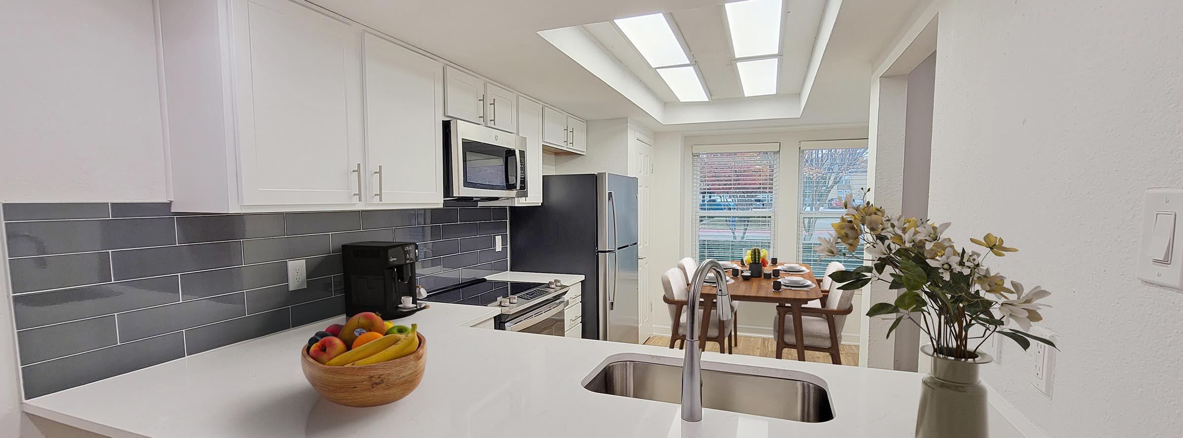 Kitchens with updated stainless steel appliances, brushed nickle fixtures, and new cabinetry.